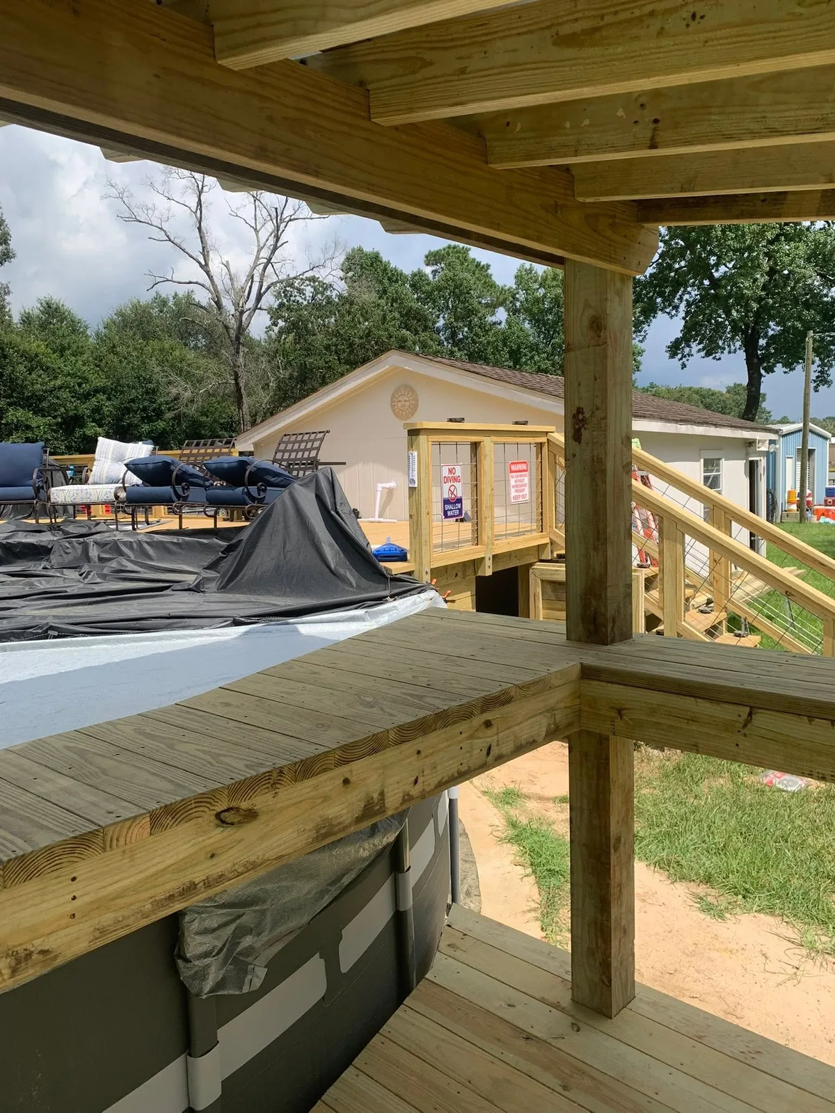 Covered deck and pool structure rebuild by All One Construction in Cleveland, TX